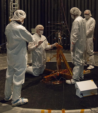 The Mars Helicopter team preparing the craft for tests.